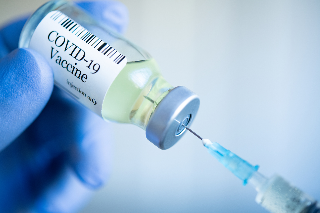 COVID-19 vaccine and needle