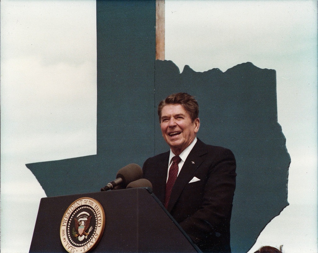 Ronald Reagan at a podium 